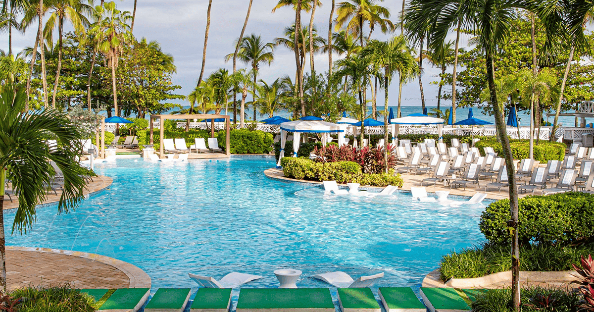 Palm-lined pool at the former InterContinental San Juan, now The Royal Sonesta San Juan.